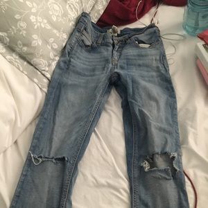 Ripped knee skinny jeans